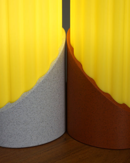 Detailed close-up showing the material texture of the cream white and tomato red Penne pasta lamp bases, alongside the unique body of the pasta shade