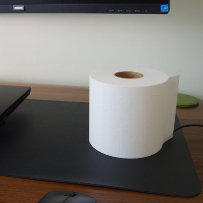 Unlit toilet paper lamp on a desk, showcasing a clean minimalist body that remains beautiful even when unlit